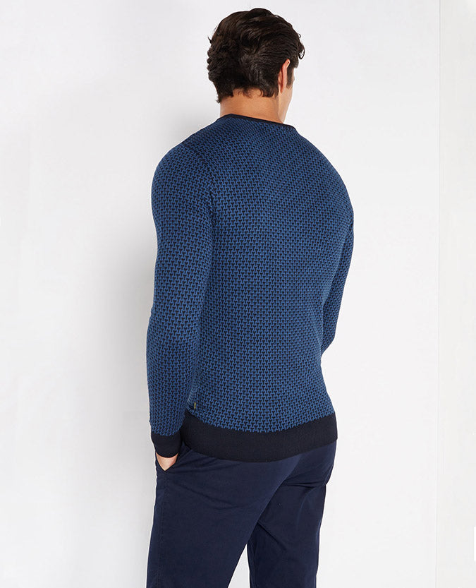 Man wearing a navy Slim Fit Merino Wool-Blend Crew Neck Sweater