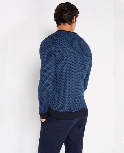 Man wearing a navy Slim Fit Merino Wool-Blend Crew Neck Sweater
