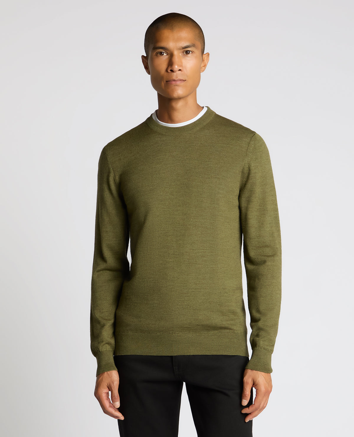 Man wearing a green Crew Neck Merino Wool-Blend Sweater