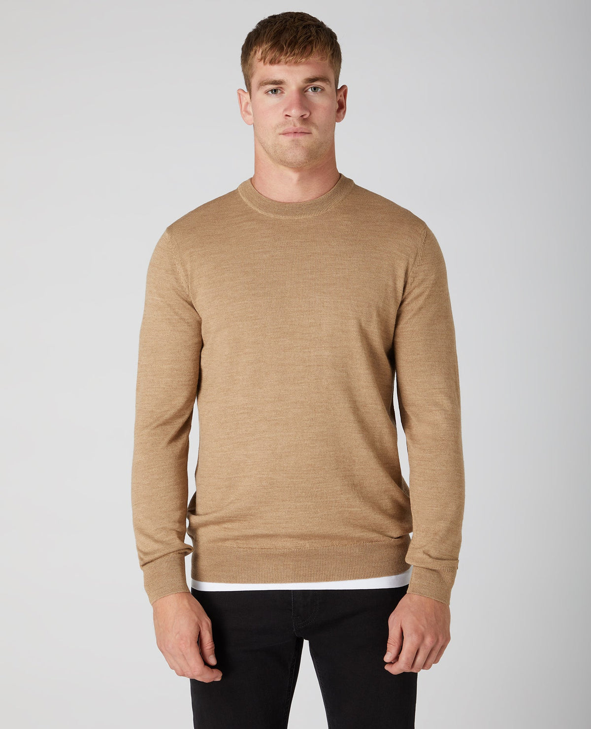 Man wearing a brown Tapered Fit Merino Wool-Blend Crew Neck Sweater