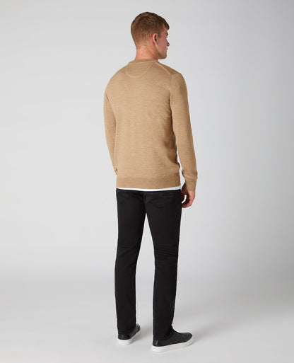 Man wearing a brown Tapered Fit Merino Wool-Blend Crew Neck Sweater