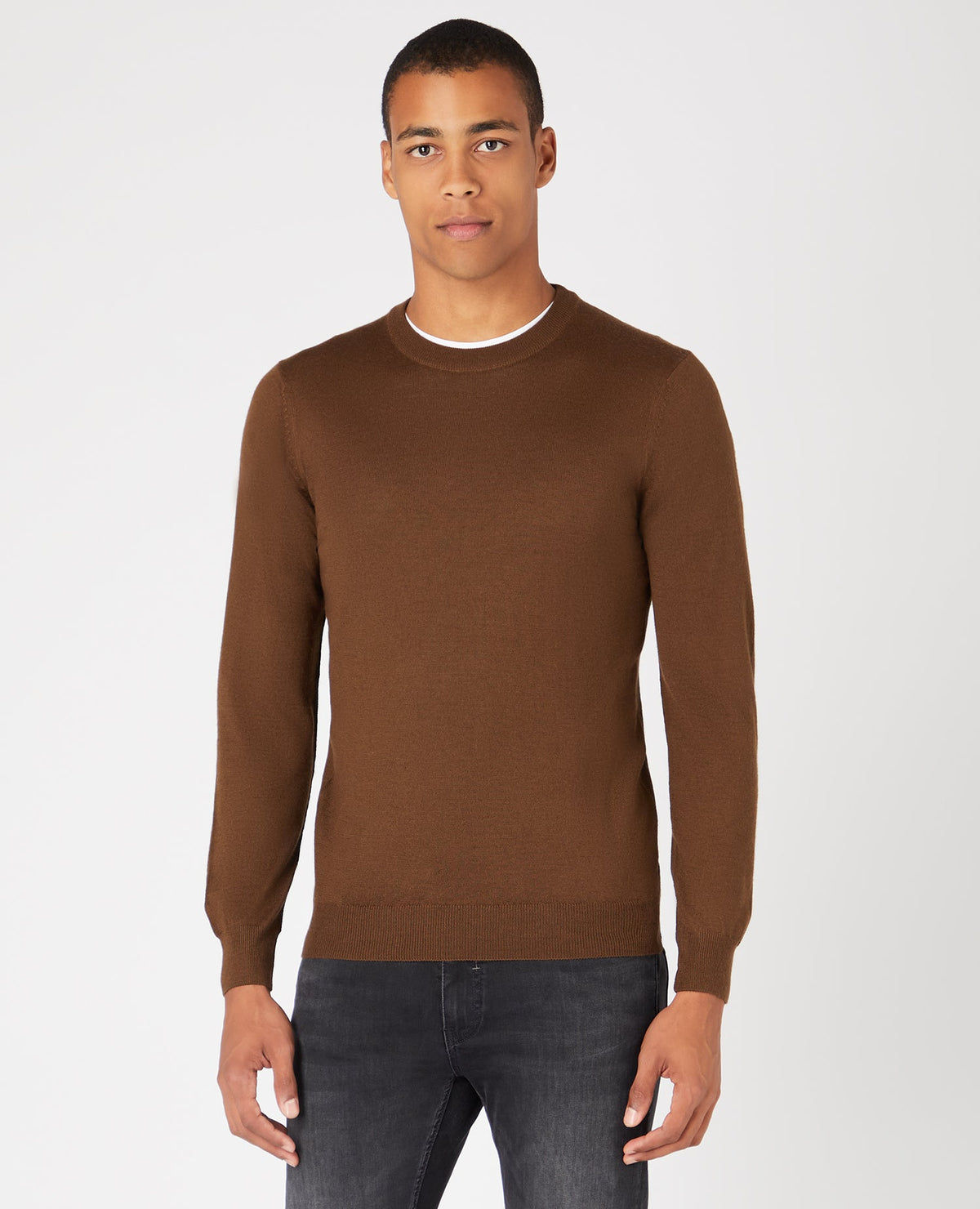 Man wearing a brown Tapered Fit Merino Wool-Acrylic Crew Neck Long Sleeve