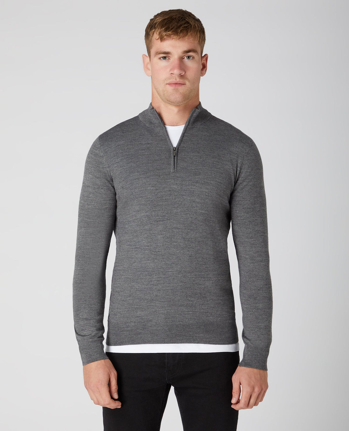 Man wearing a grey Tapered Fit Merino Wool-Blend Half Zip Sweater