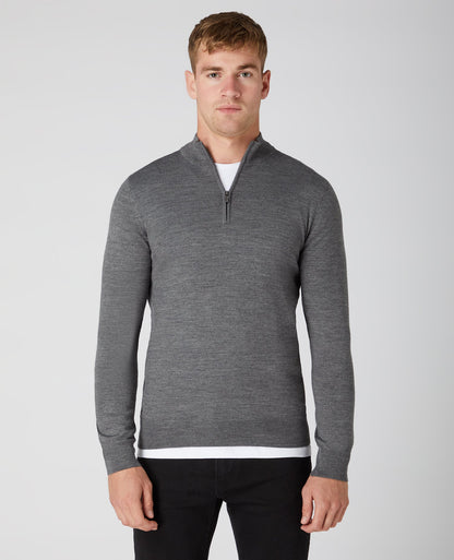 Man wearing a grey Tapered Fit Merino Wool-Blend Half Zip Sweater