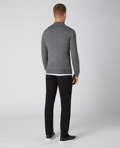 Man wearing a grey Tapered Fit Merino Wool-Blend Half Zip Sweater