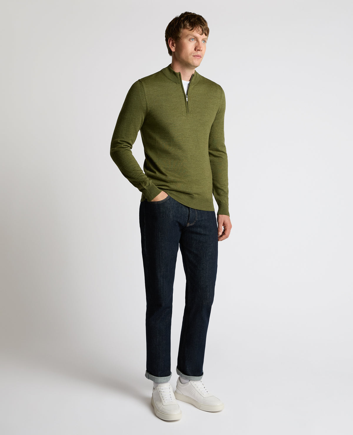 Man wearing a green Half Zip Merino Wool-Blend Sweater