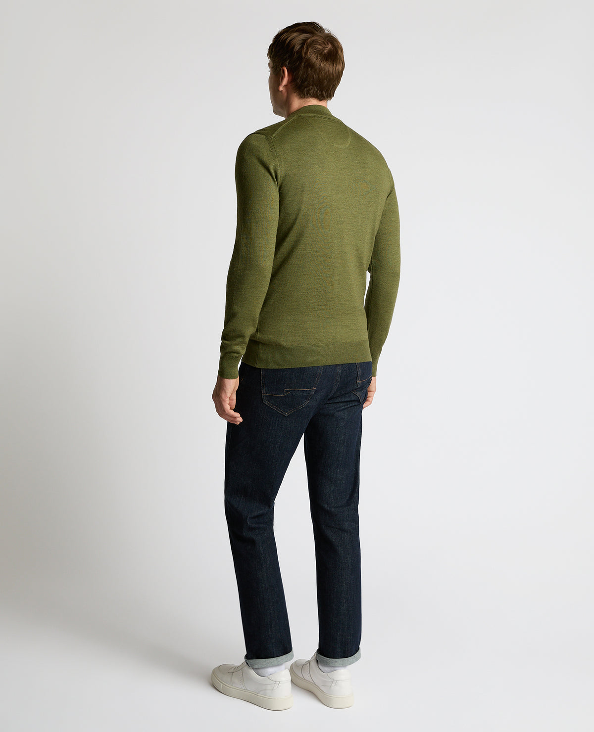 Man wearing a green Half Zip Merino Wool-Blend Sweater