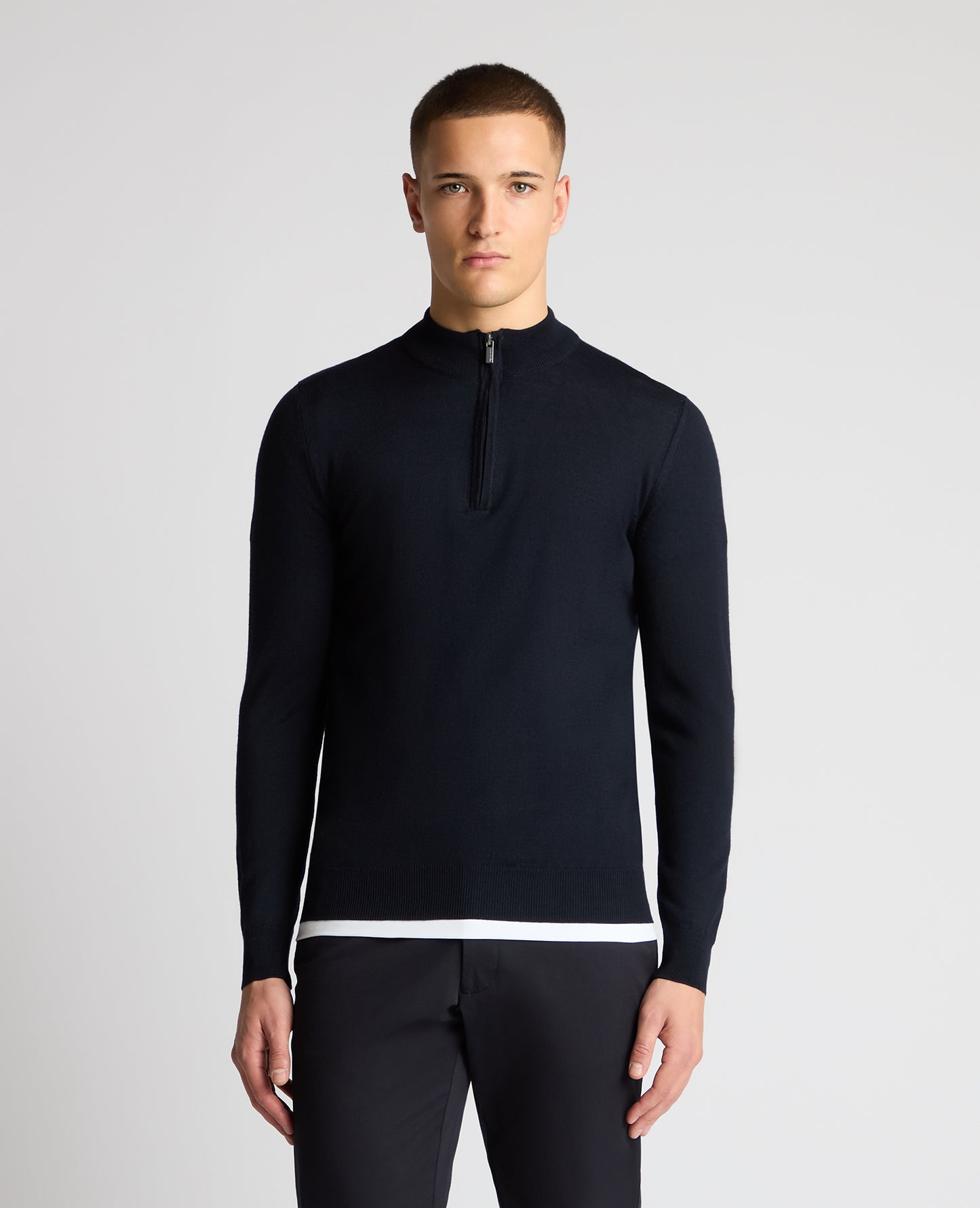 Man wearing a navy jumper