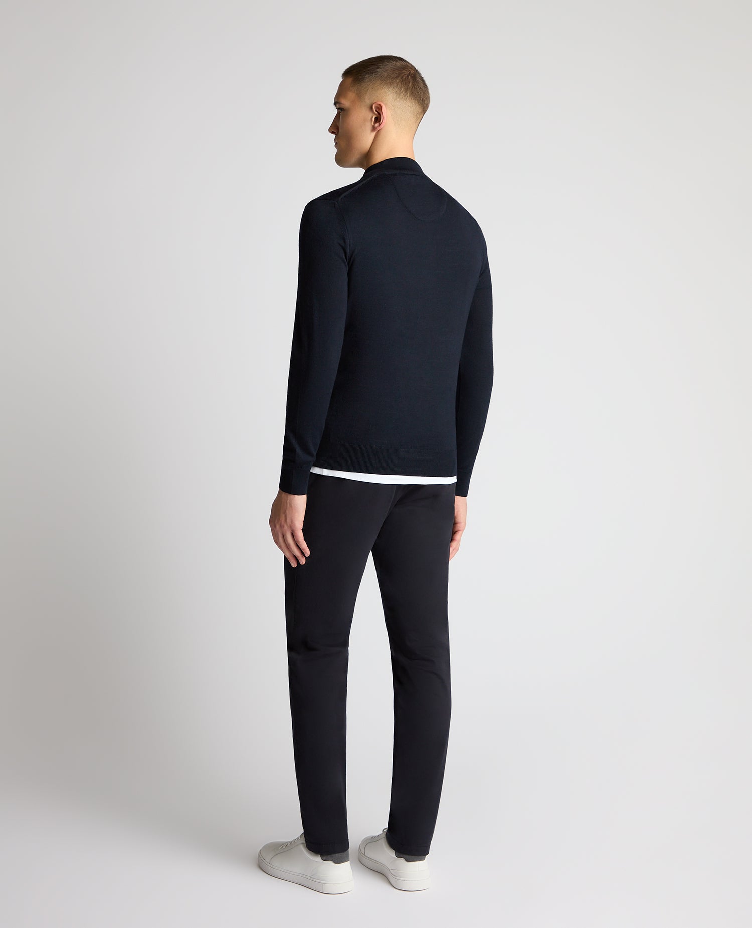 Man wearing a navy jumper