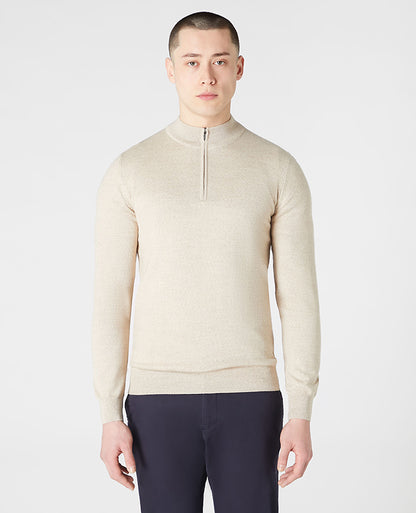 Man wearing a sand Tapered Fit Merino Wool Half Zip Sweater