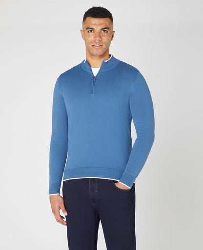 Man wearing a blue Slim Fit Knitted Cotton Half Zip Sweater
