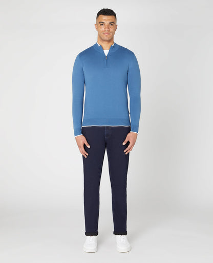 Man wearing a blue Slim Fit Knitted Cotton Half Zip Sweater