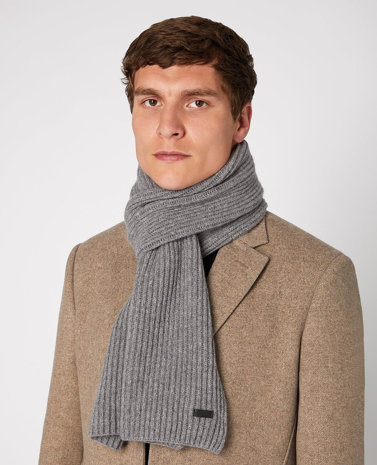 Man wearing a grey Rib-Knit Wool Rich Scarf