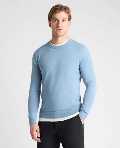 Man wearing a blue jumper