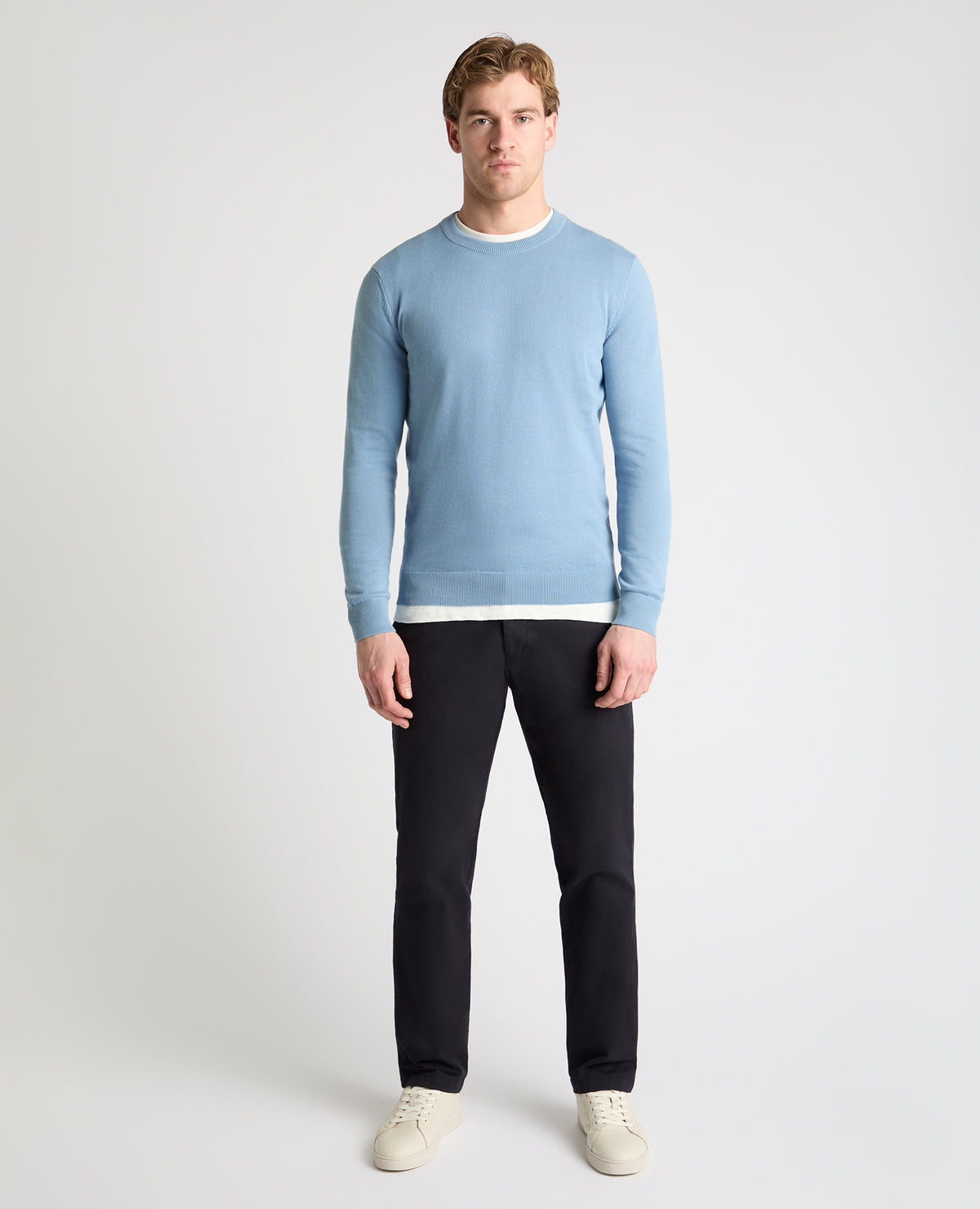 Man wearing a blue jumper