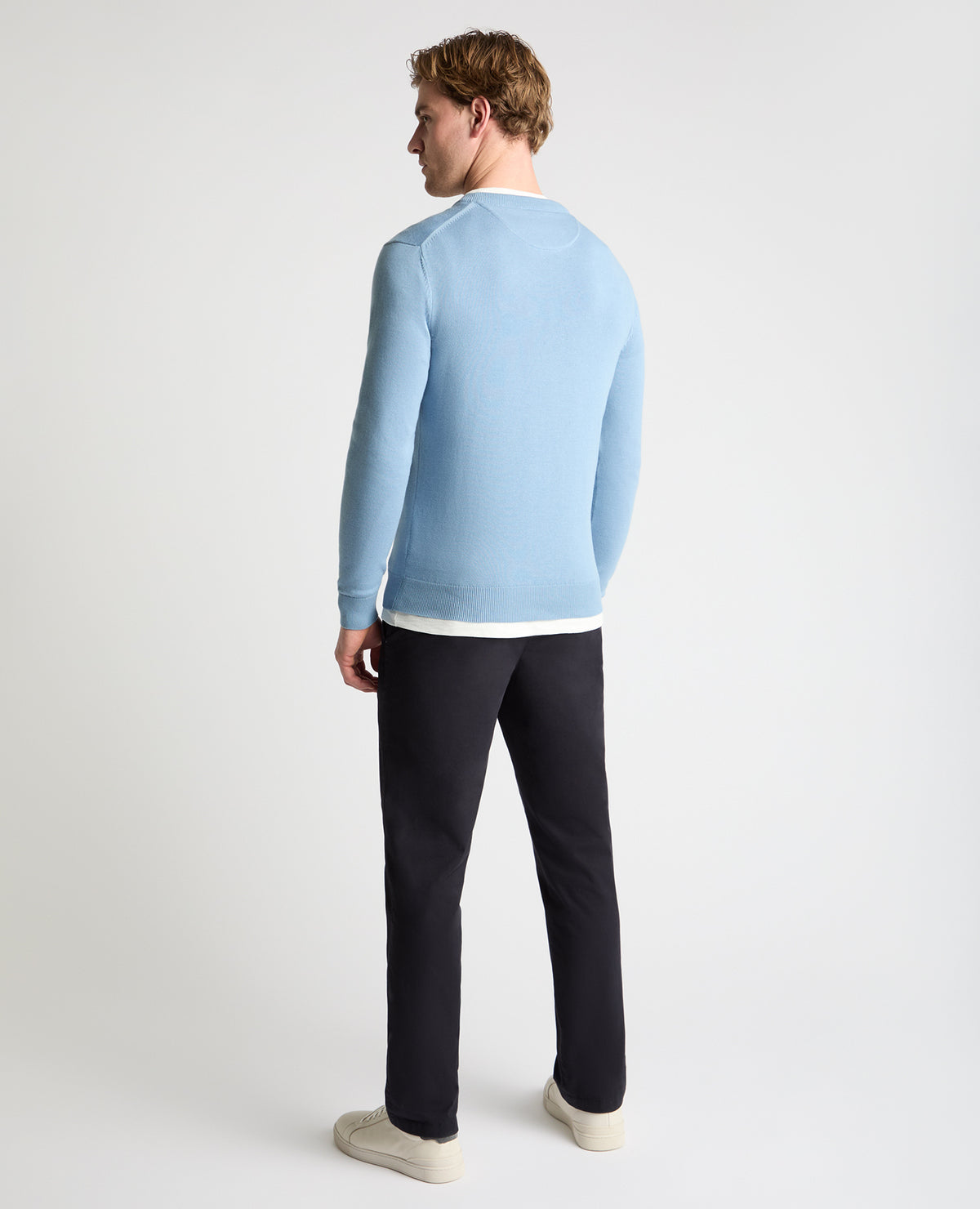 Man wearing a blue jumper