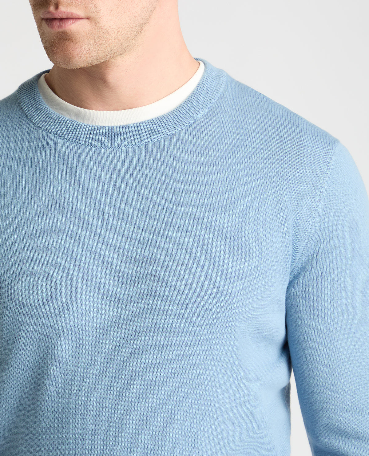 Man wearing a blue jumper
