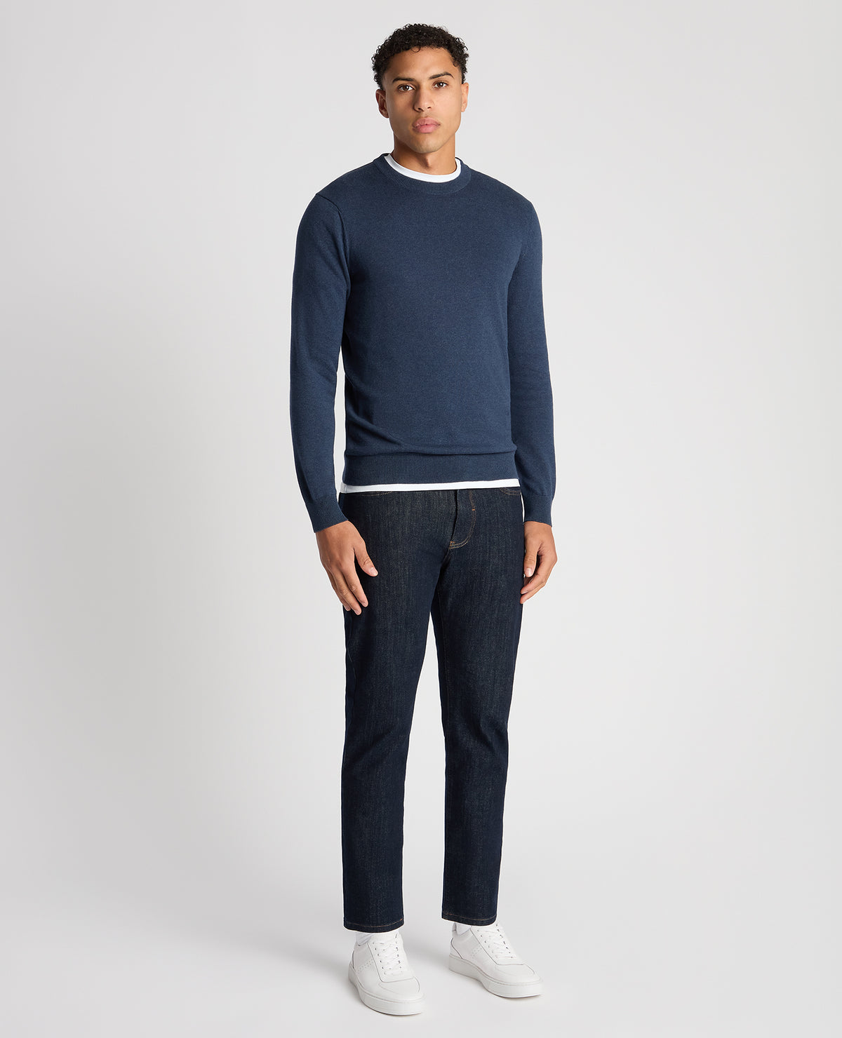 Man wearing a blue Tapered Fit Cotton Crew Neck Sweater