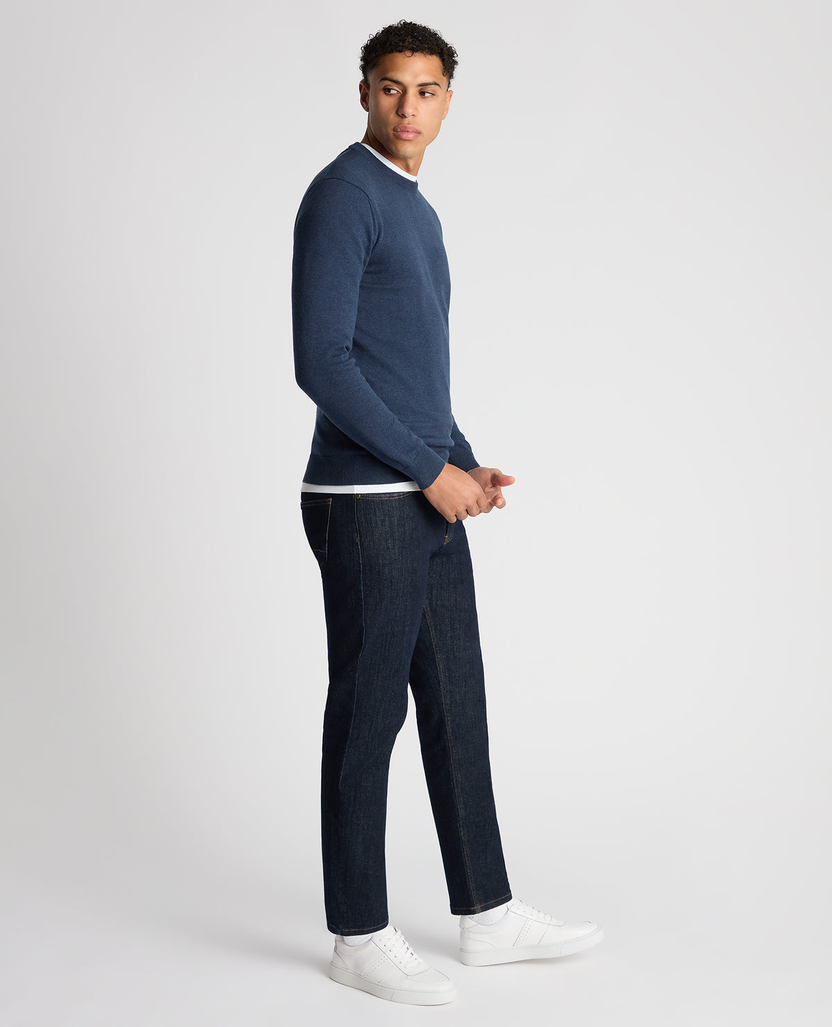 Man wearing a blue Tapered Fit Cotton Crew Neck Sweater