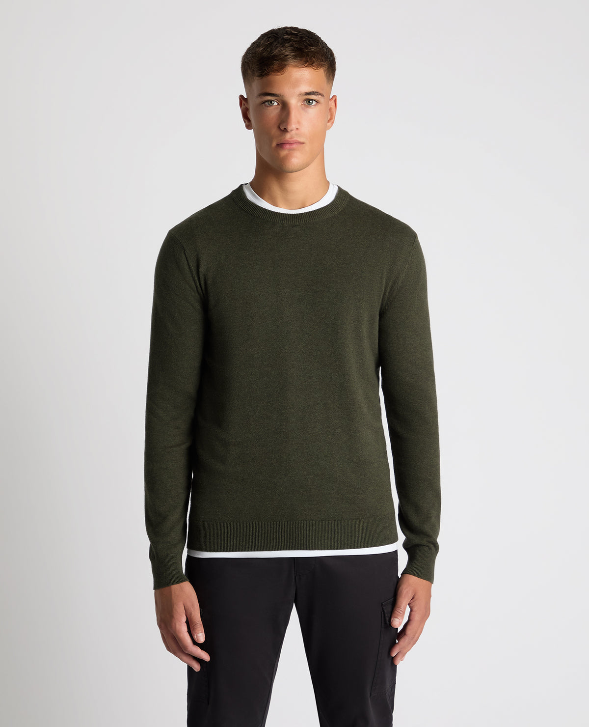 Man wearing a green Tapered Fit Cotton Crew Neck Sweater