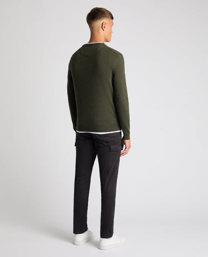 Man wearing a green Tapered Fit Cotton Crew Neck Sweater