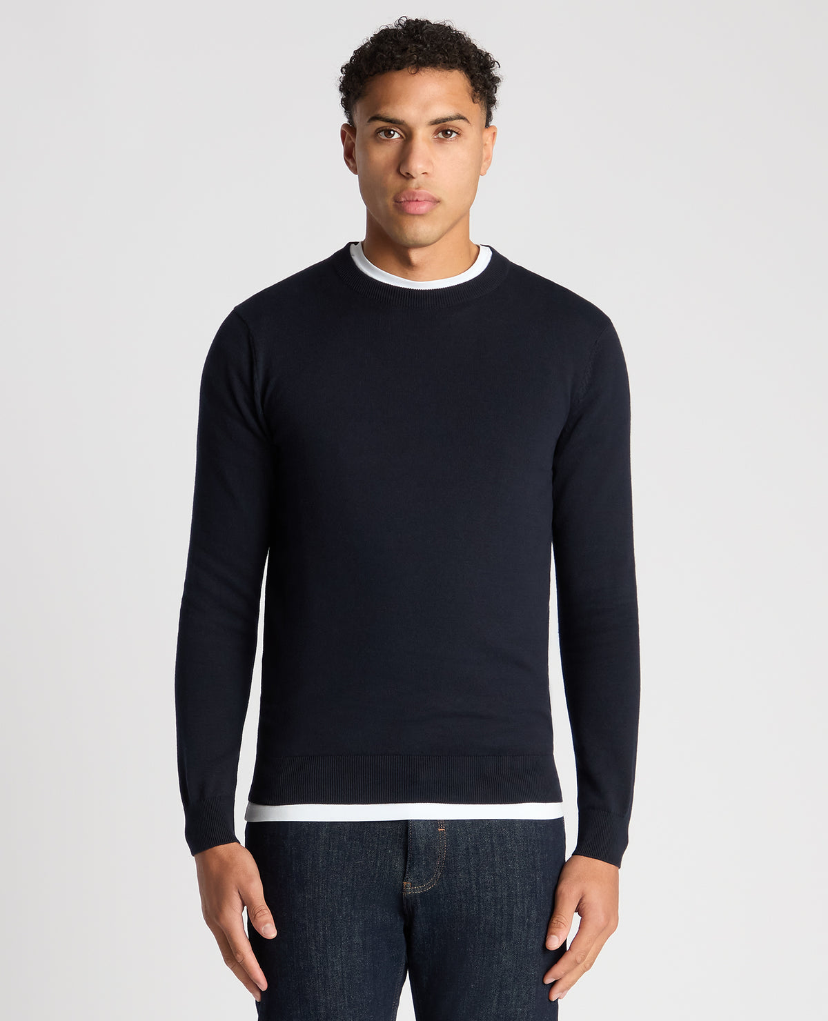 Man wearing a navy Tapered Fit Cotton Crew Neck Sweater