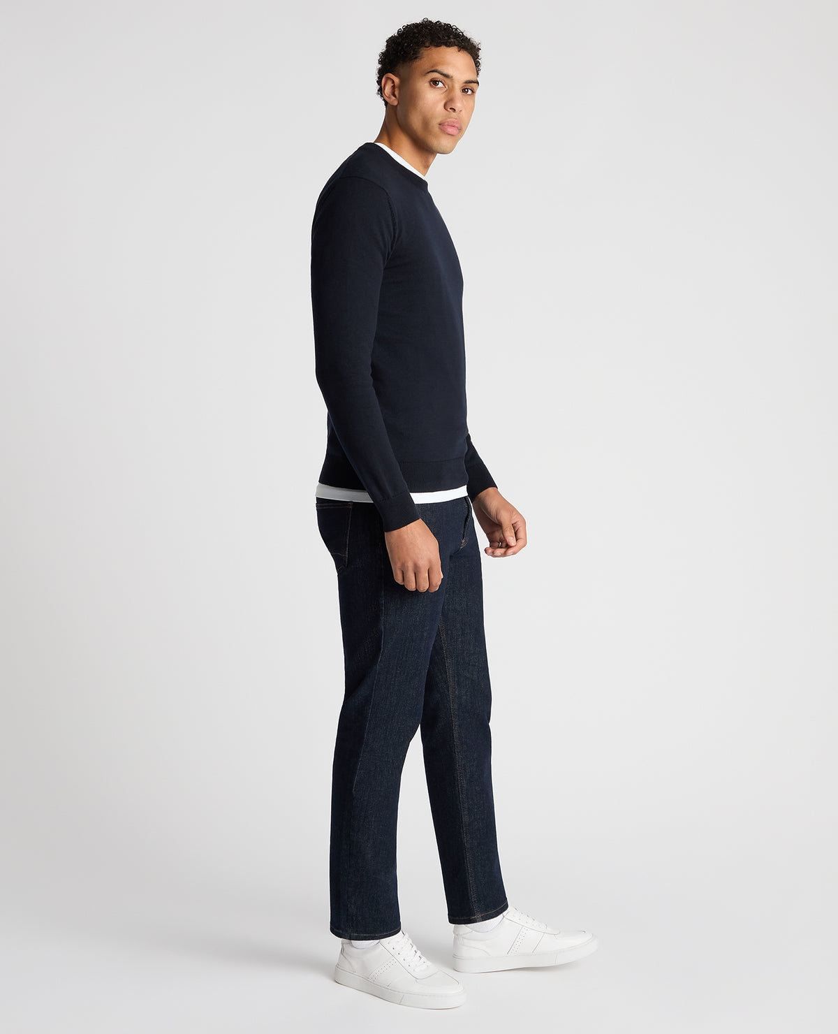 Man wearing a navy Tapered Fit Cotton Crew Neck Sweater