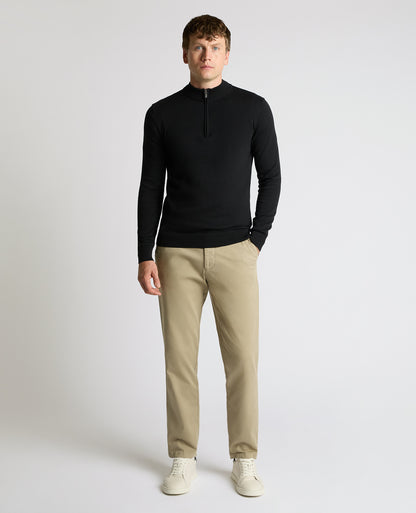 Man wearing a black Half Zip Cotton Sweater