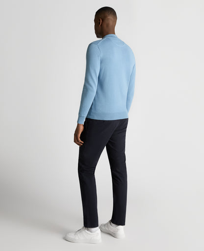 Man wearing a blue Tapered Fit Half Zip Cotton Sweater