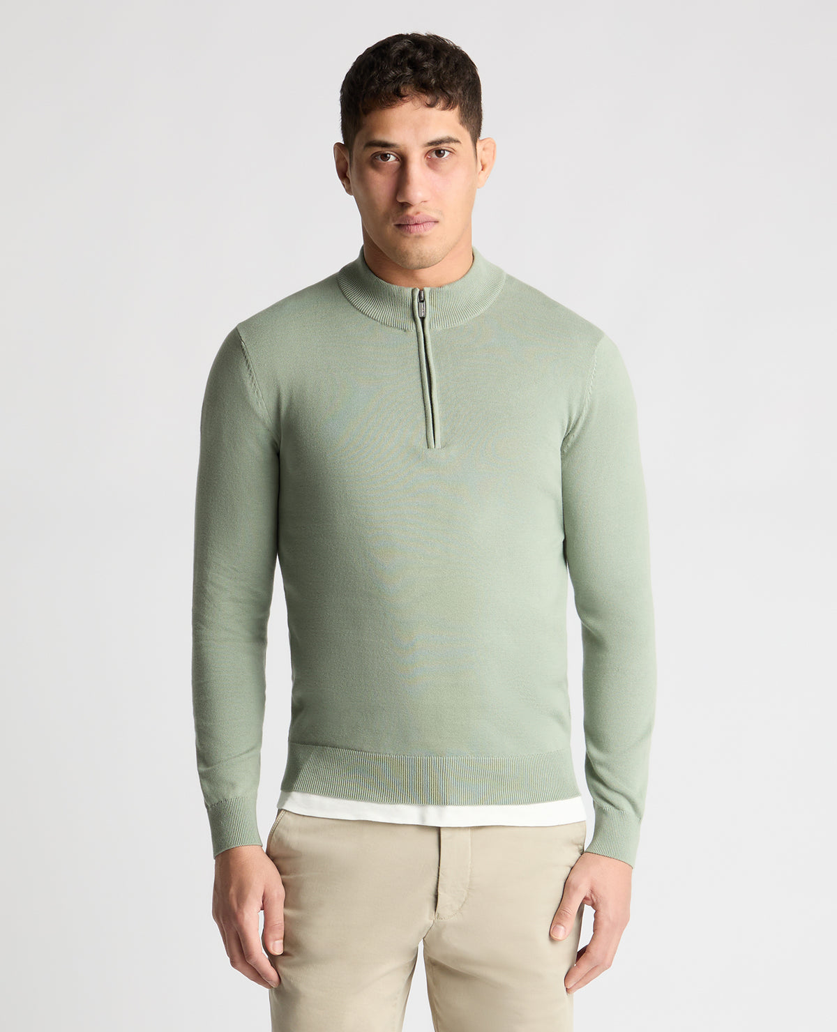 Man wearing a green jumper