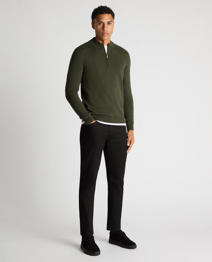 Man wearing a green Tapered Fit Half Zip Cotton Sweater