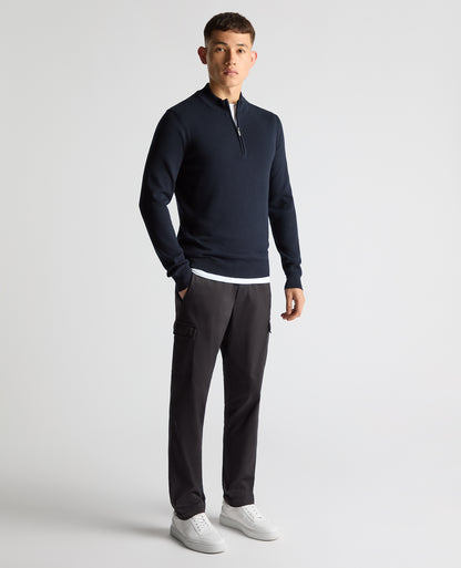 Man wearing a navy Tapered Fit Half Zip Cotton Sweater
