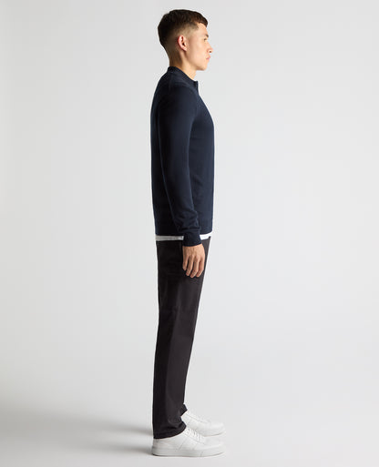 Man wearing a navy Tapered Fit Half Zip Cotton Sweater