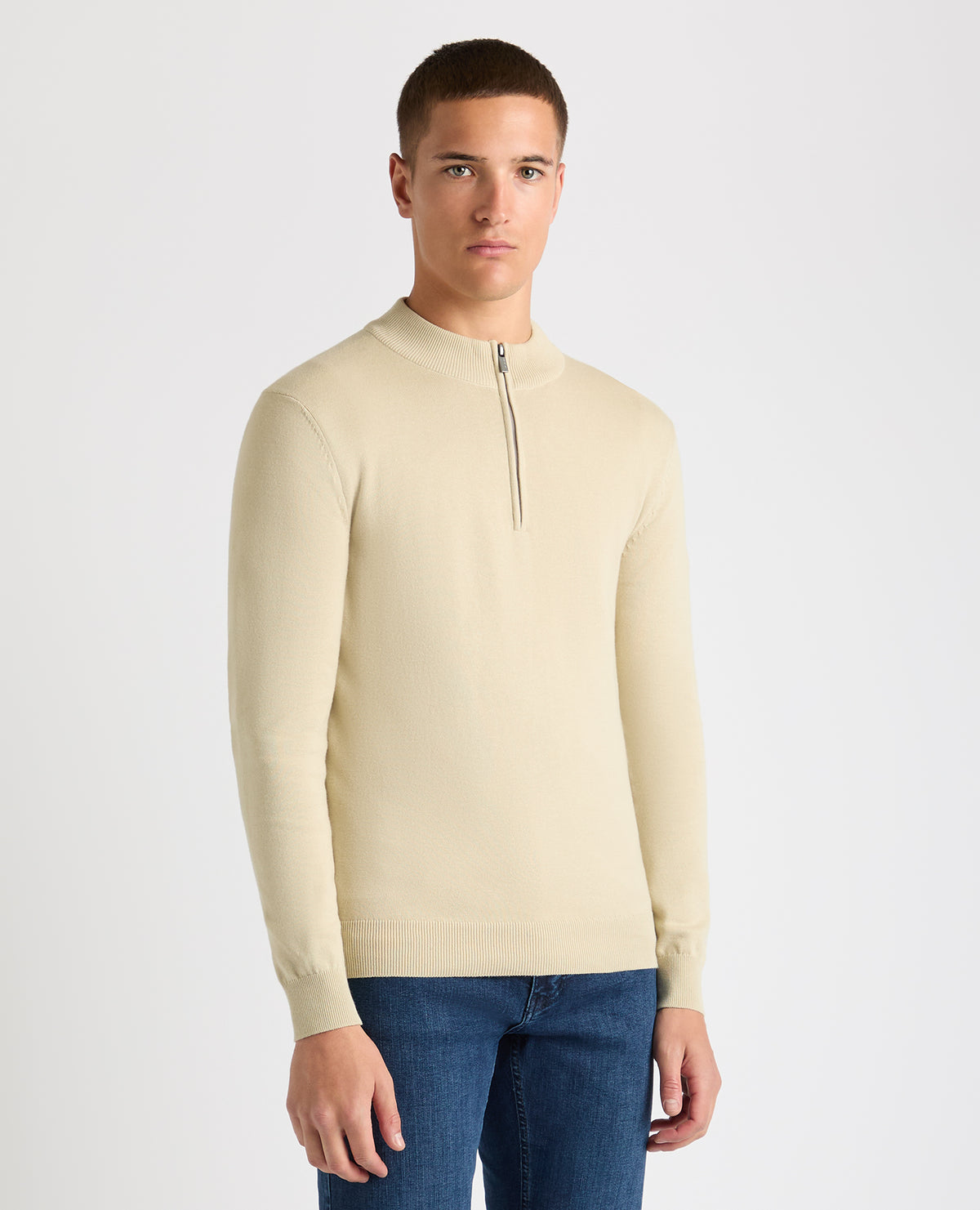 Man wearing a sand Tapered Fit Half Zip Cotton Sweater