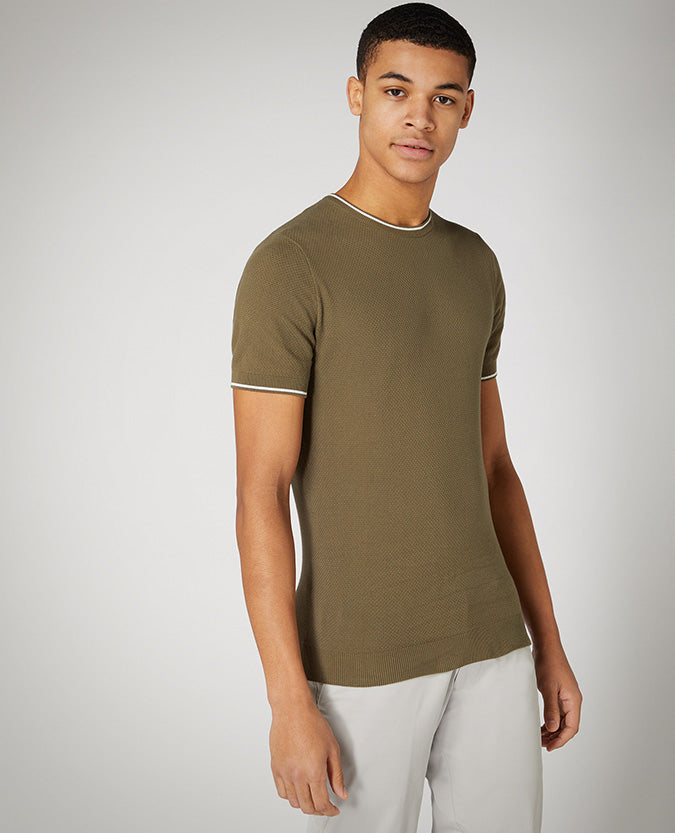 Man wearing a green Slim Fit Knitted Cotton T-Shirt