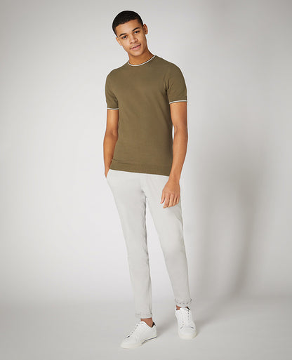 Man wearing a green Slim Fit Knitted Cotton T-Shirt
