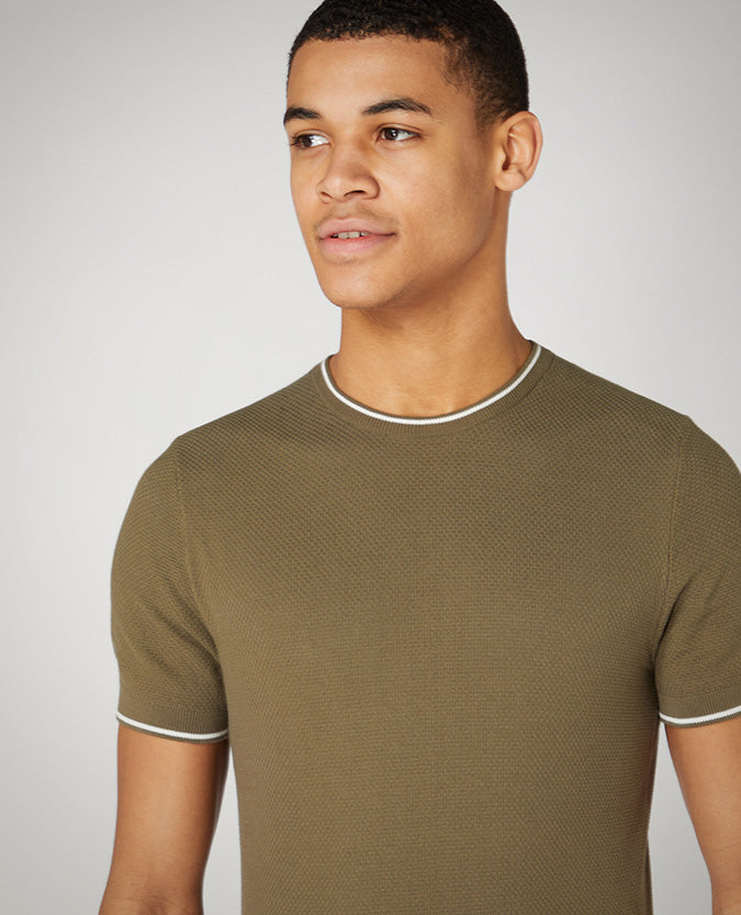 Man wearing a green Slim Fit Knitted Cotton T-Shirt