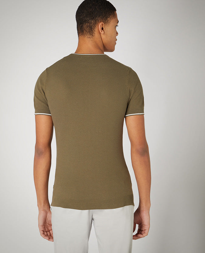 Man wearing a green Slim Fit Knitted Cotton T-Shirt