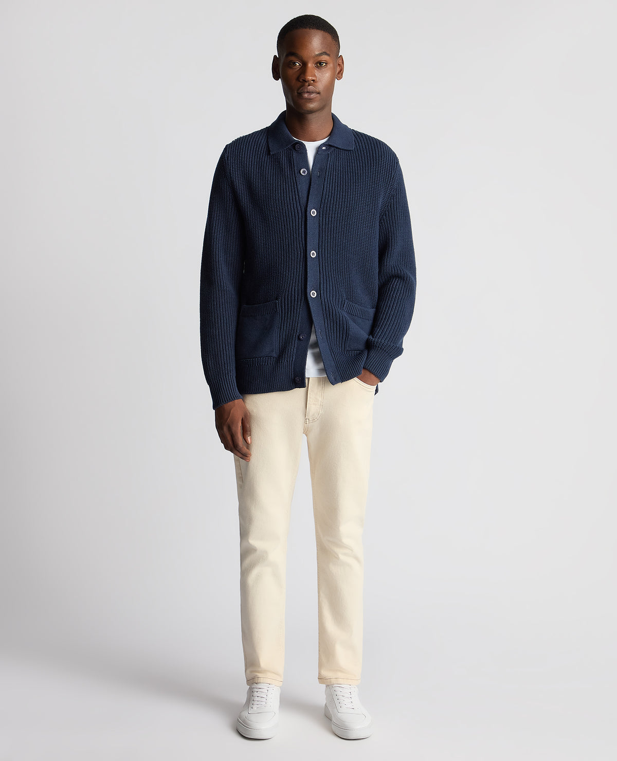 Man wearing a blue Tapered Fit Chunky Knit Cardigan