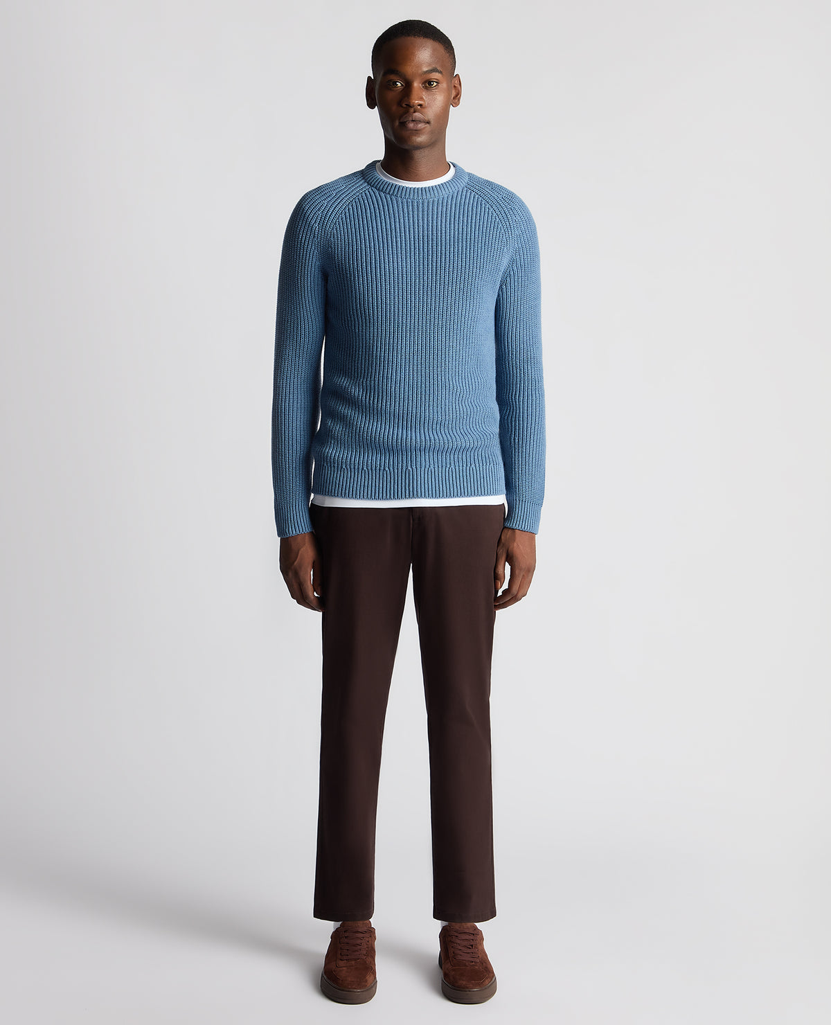 Man wearing a blue Tapered Fit Cotton Crew Neck