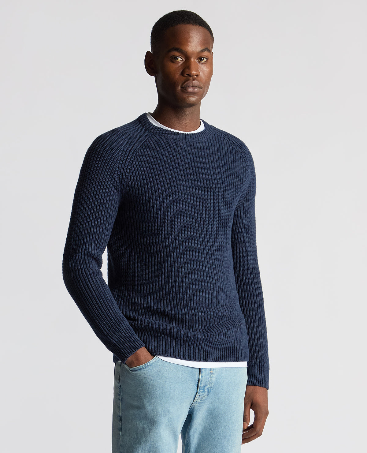 Man wearing a blue Tapered Fit Chunky Knit Sweater