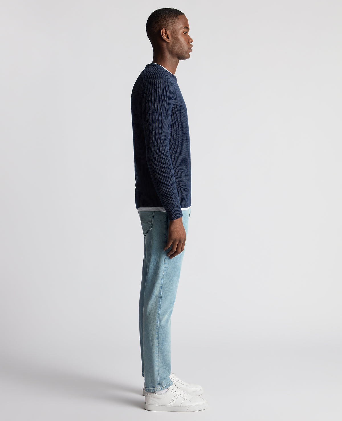 Man wearing a blue Tapered Fit Chunky Knit Sweater