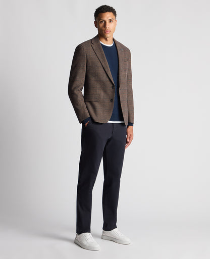 Man wearing a blue Tapered Fit Merino Wool-Blend Sweater