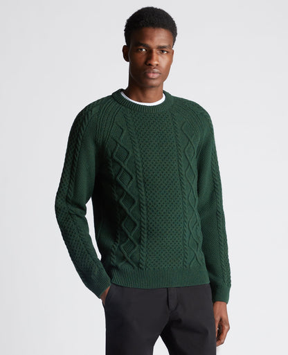 Man wearing a green Tapered Fit Wool-Blend Crew Neck Sweater