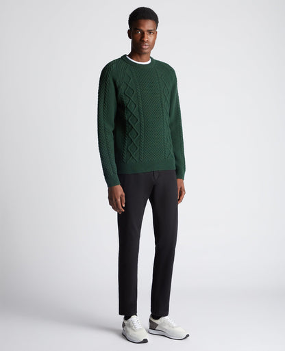 Man wearing a green Tapered Fit Wool-Blend Crew Neck Sweater