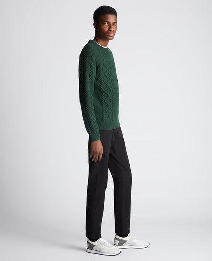 Man wearing a green Tapered Fit Wool-Blend Crew Neck Sweater