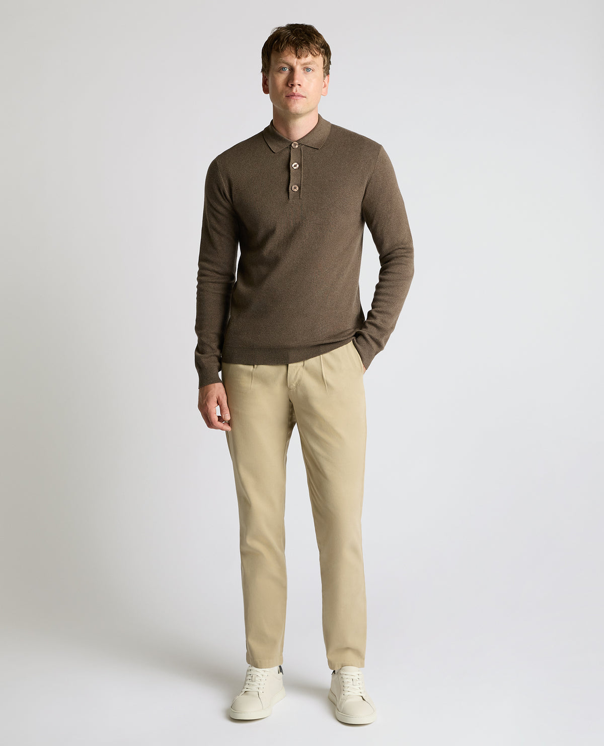 Man wearing a brown Long Sleeve Cotton Knit Polo