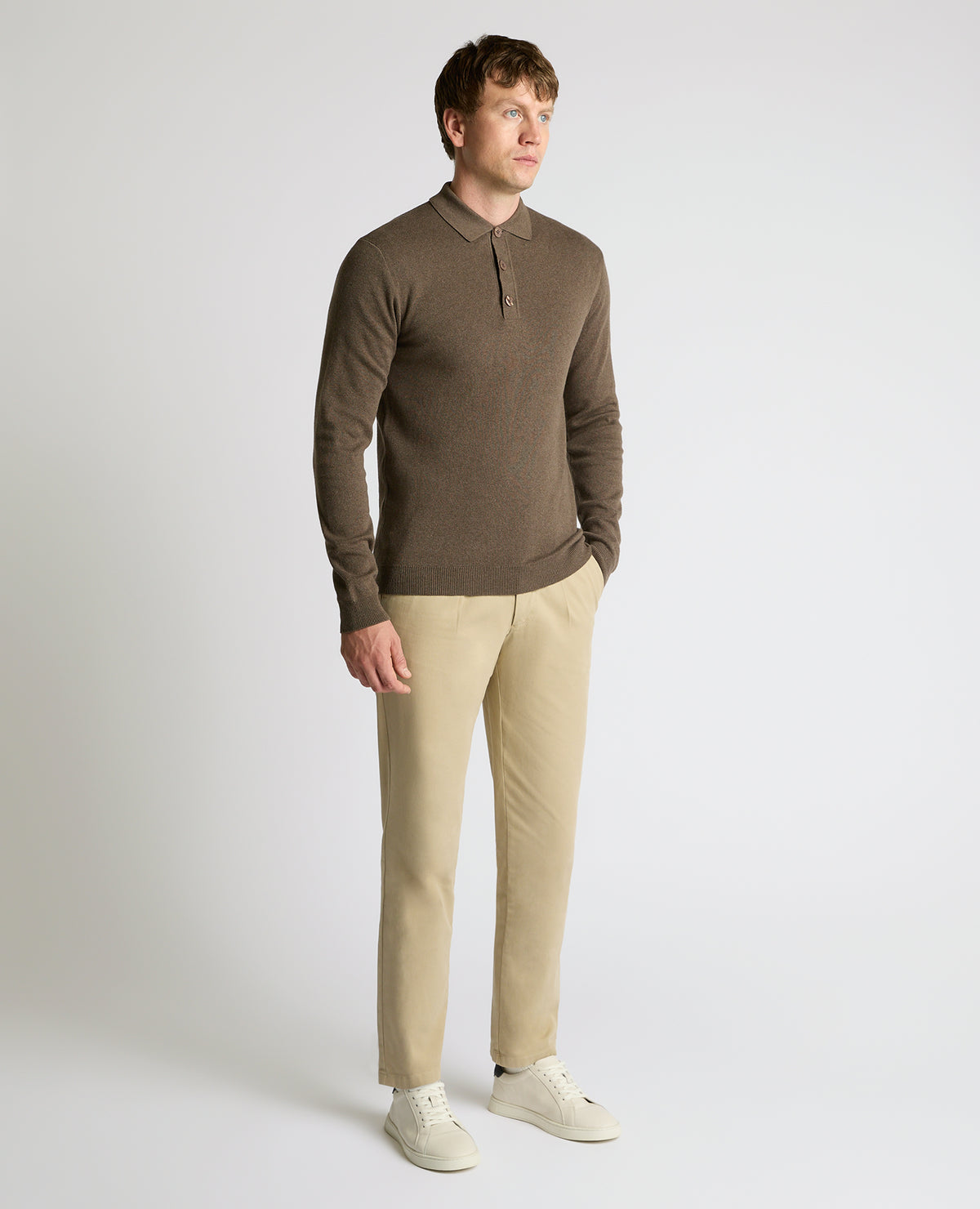 Man wearing a brown Long Sleeve Cotton Knit Polo