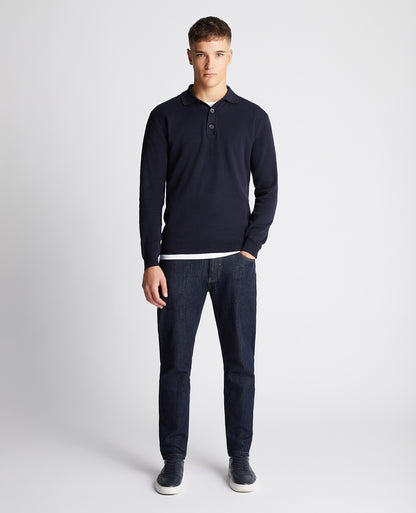 Man wearing a navy Relaxed Fit Long Sleeve Polo