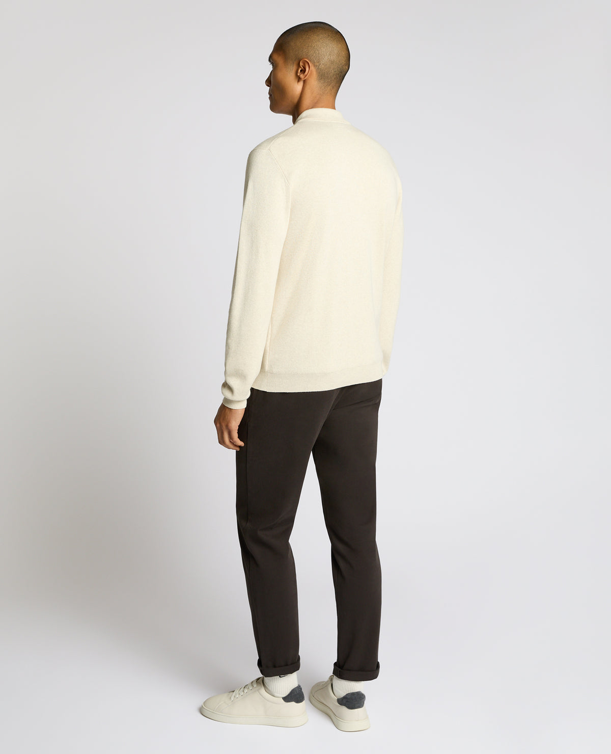 Man wearing a sand Long Sleeve Cotton Knit Polo
